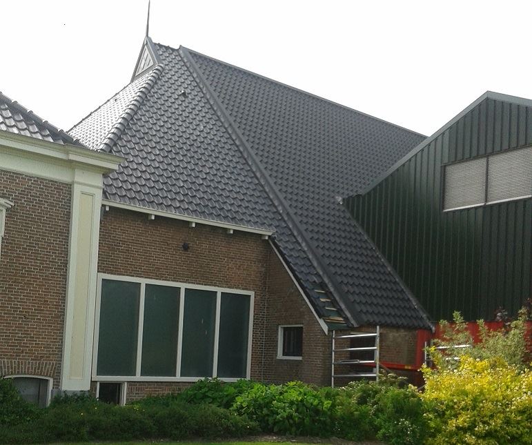 dakpanpanelen woning